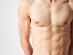 Muscular male torso has no excess tissue around the chest.