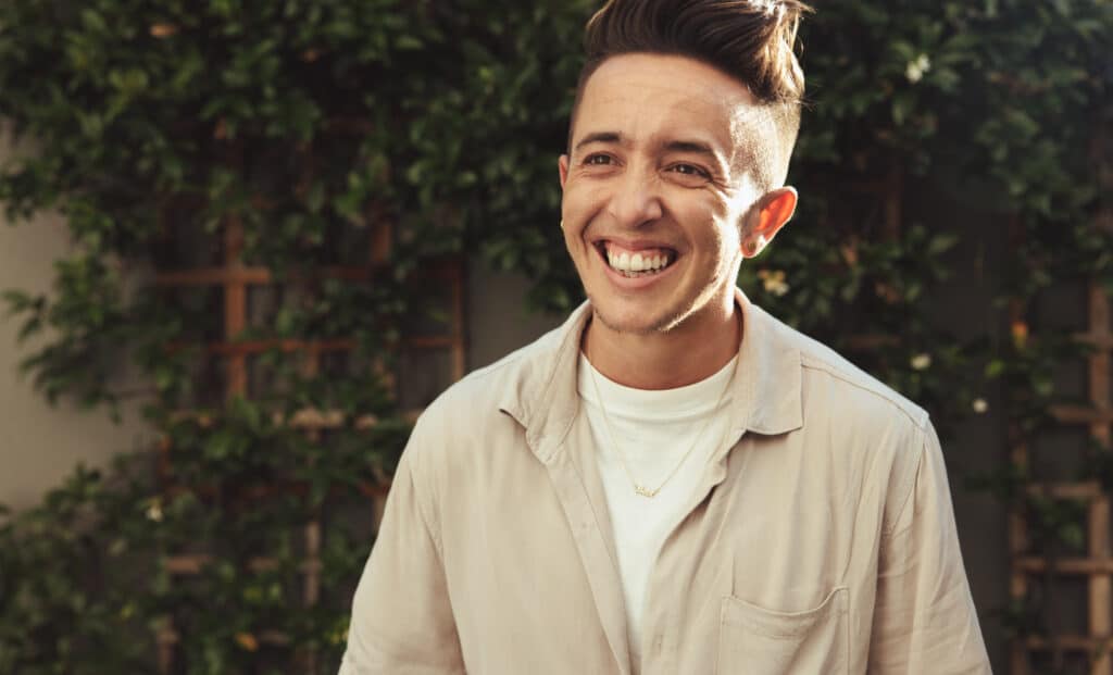 Happy transman smiling cheerfully
